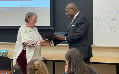 Dr. Ellen Long accepts the Skully's Circle award