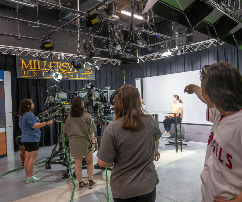 student in TV studio