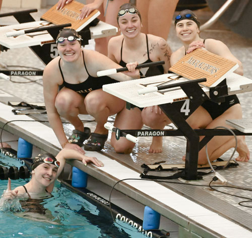 Ville Swim team gathers for a photo