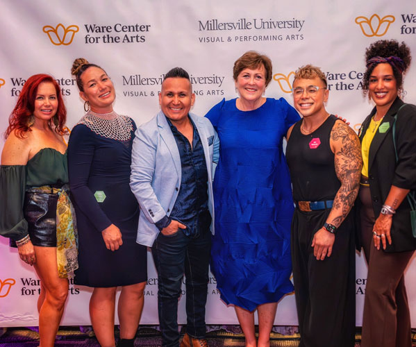 Group posing at Millersville University Ware Center arts event.