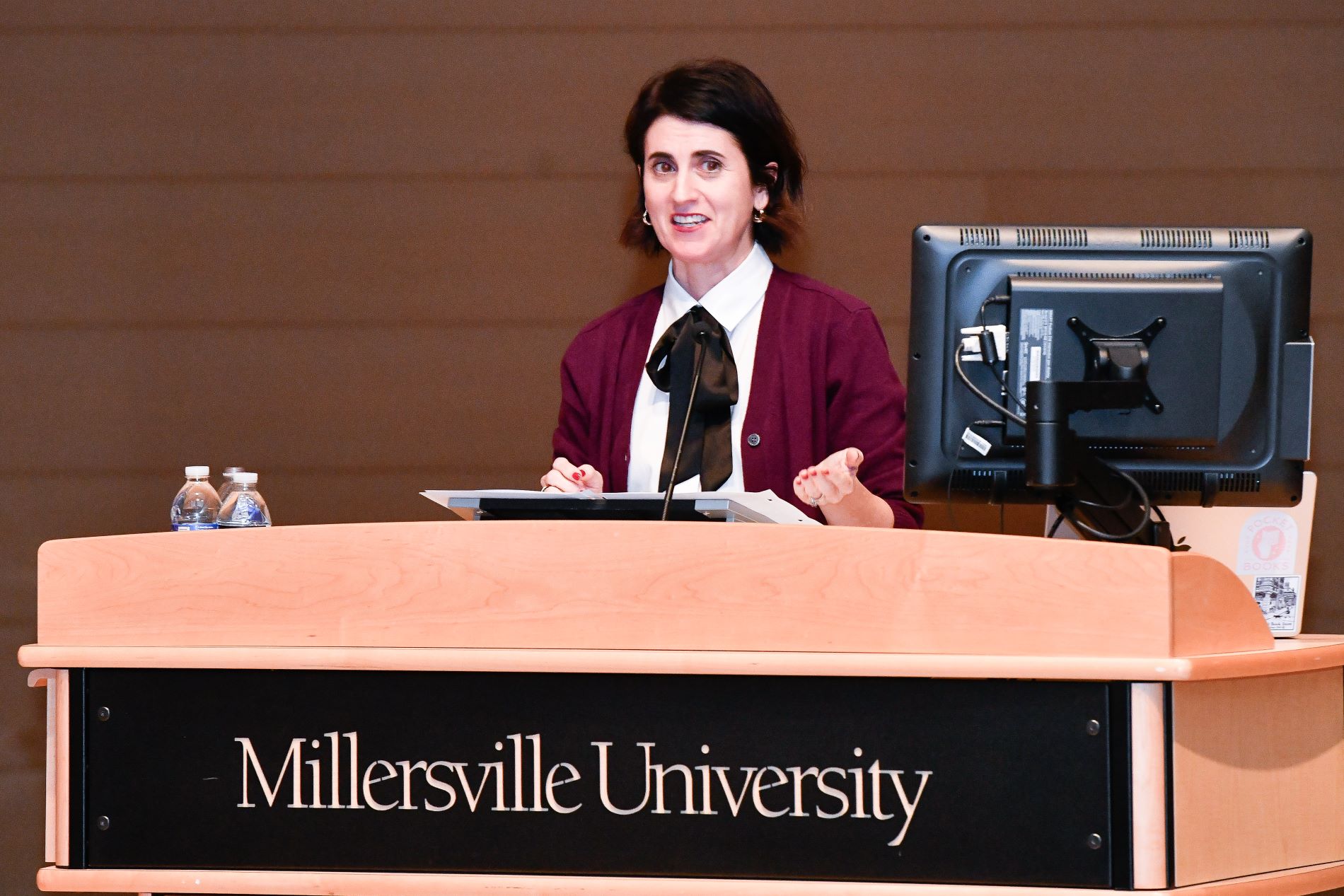 Sarah Sobieraj, PhD, at a Millersville University Podium